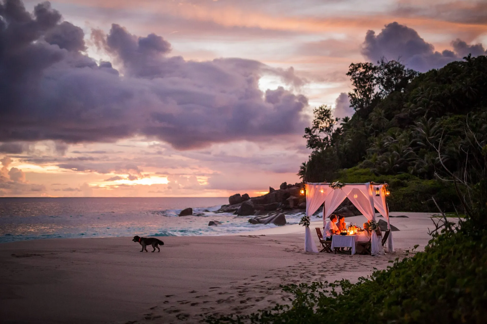 Couple enjoing sunset in Seychelles